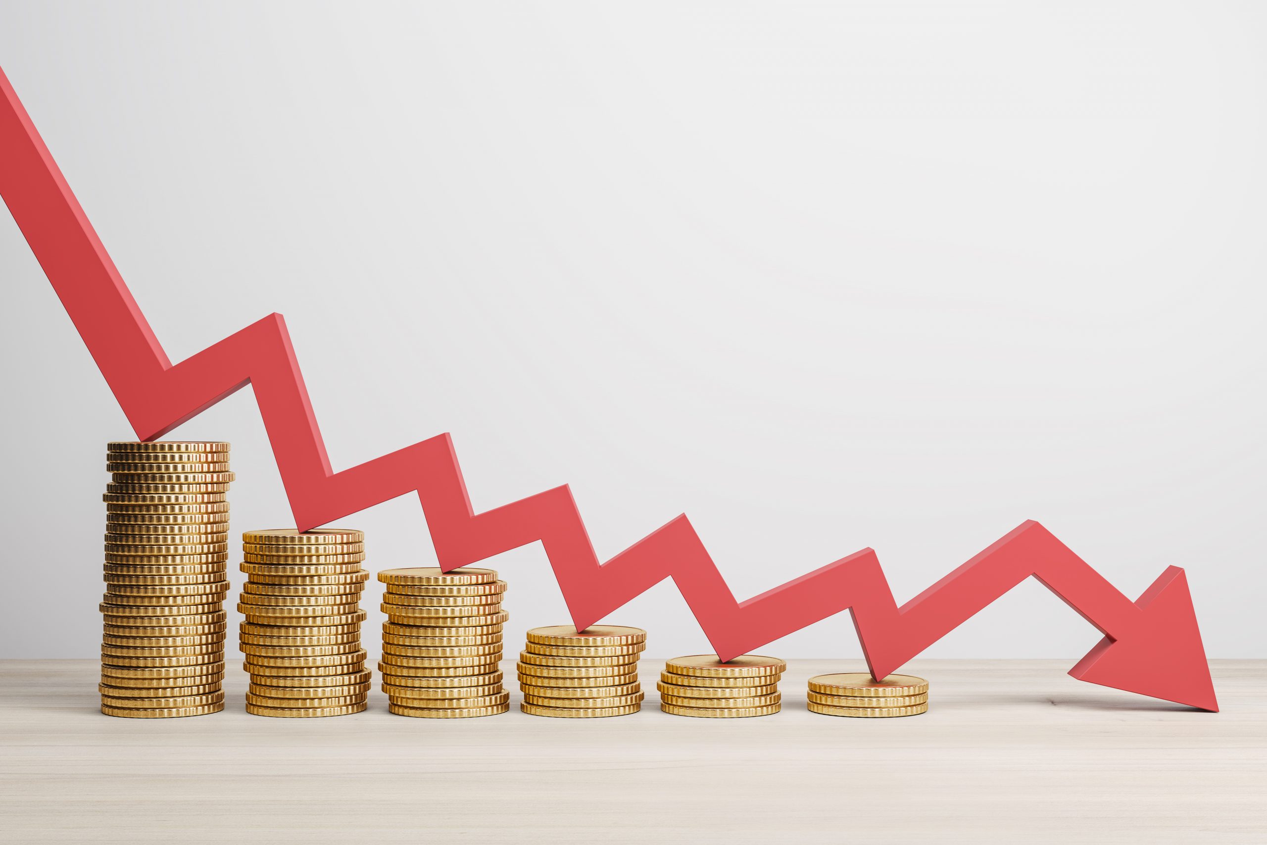Inflation and global economy crisis concept with red arrow going down on golden coin stacks. 3D rendering tpfx