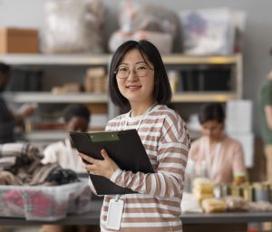 volunteer-organizing-donations-charity